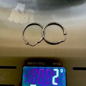 Medium white gold hoop earrings